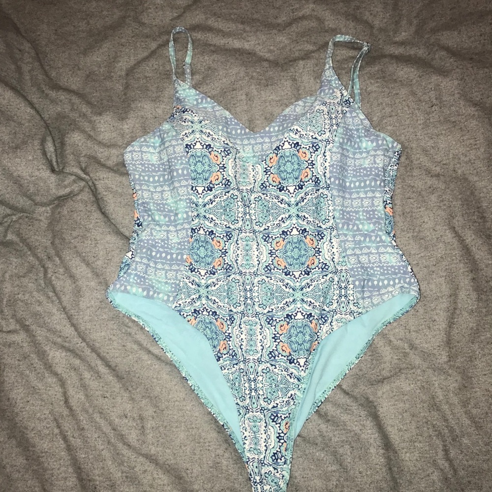 Low back full piece bathing suit never worn